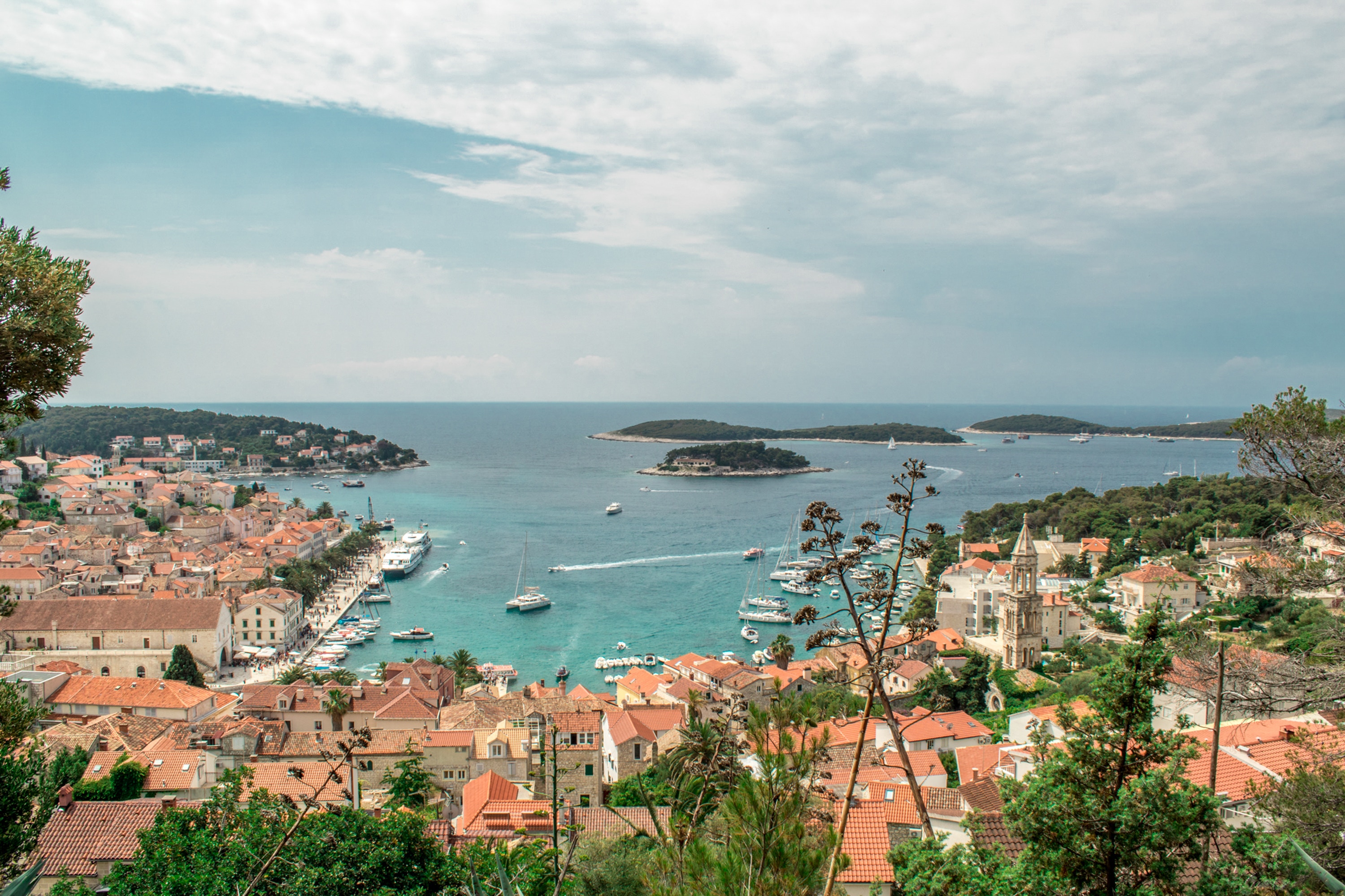 Serene view of the sparkling waters in the picturesque town of Hvar, reflecting the beauty of the surrounding landscape