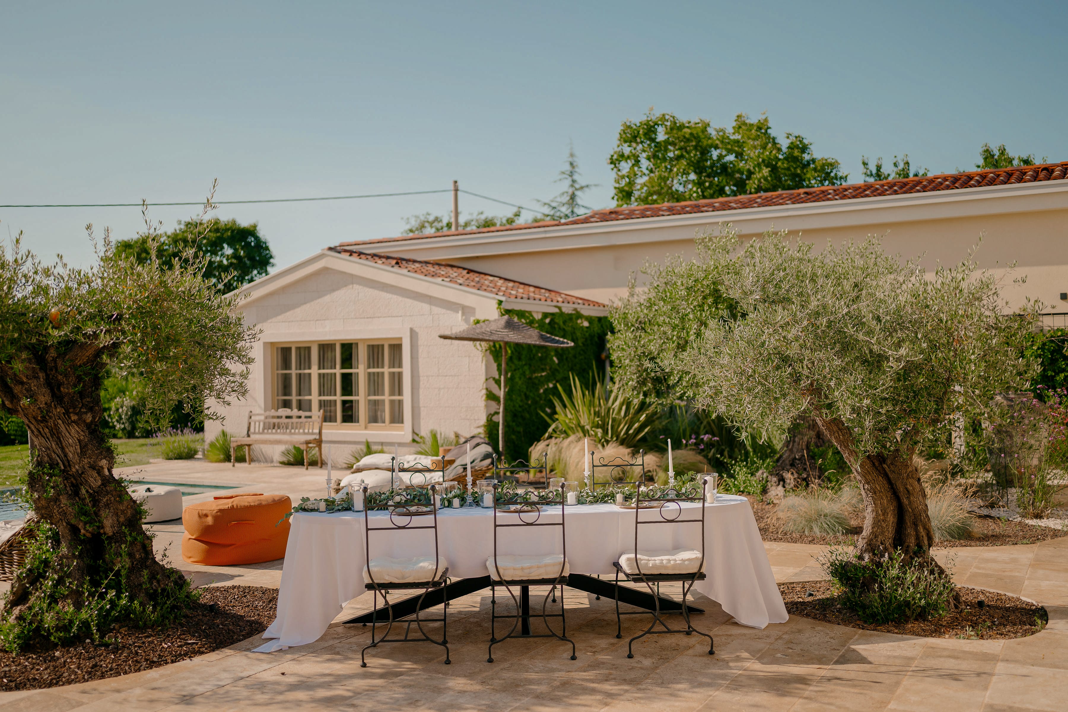 A beautifully set dining table in the garden of a private luxury villa in Istria