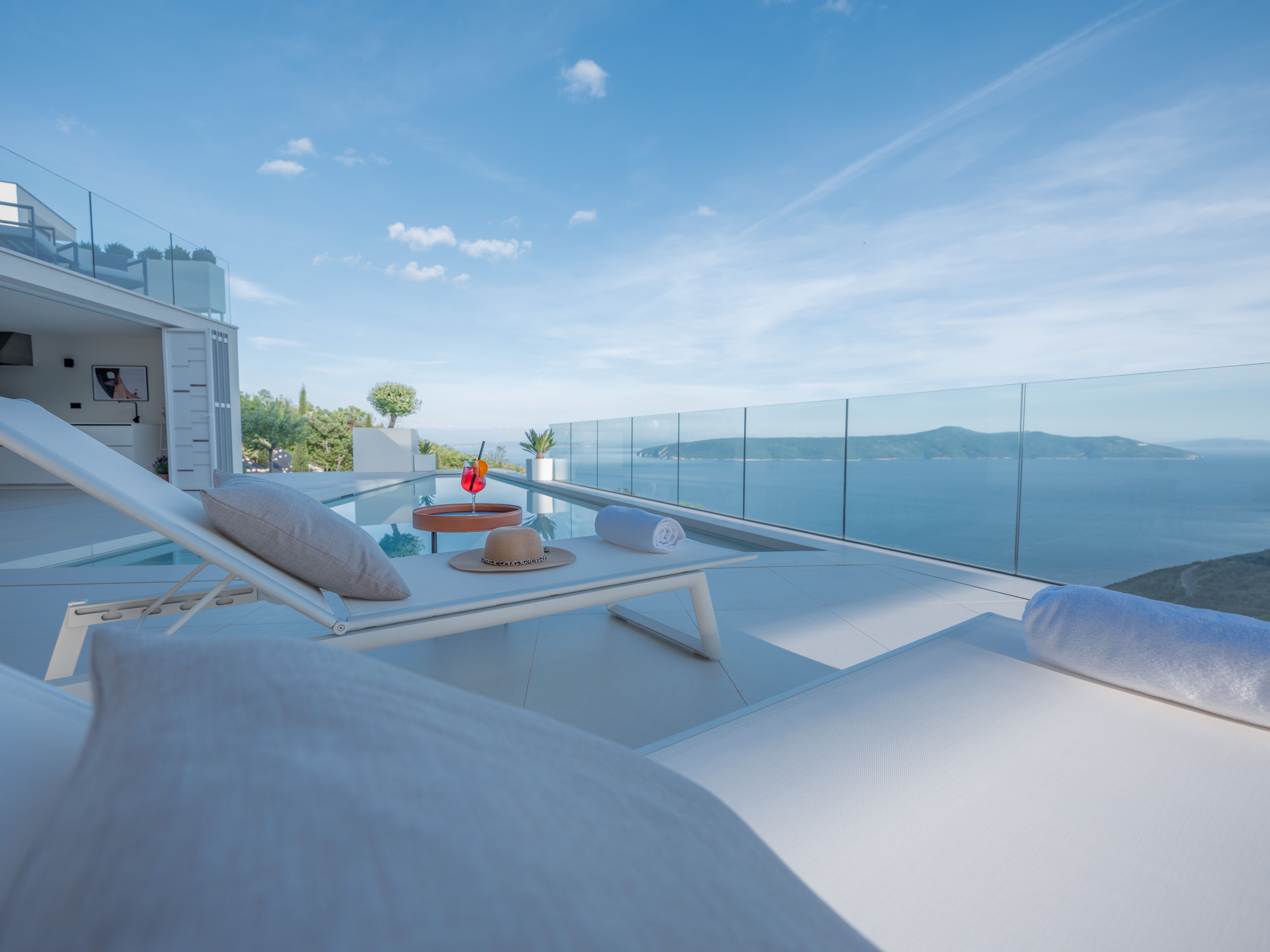 Outdoor swimming pool terrace with summer kitchen and wonderful view in Villa Absolute Istria