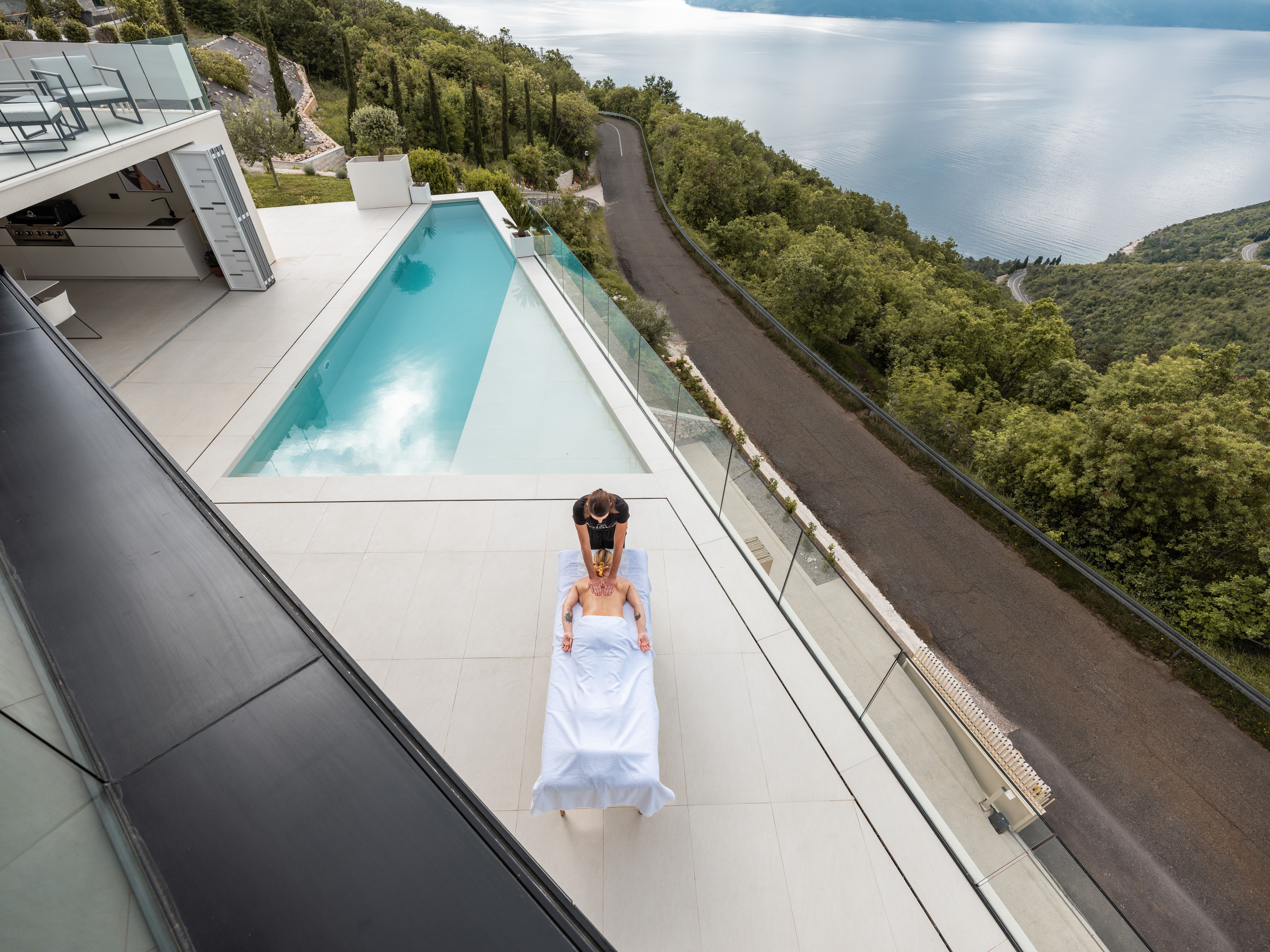 Massage on a terrace with a swimming pool and stunning view in Villa Absolute Istria
