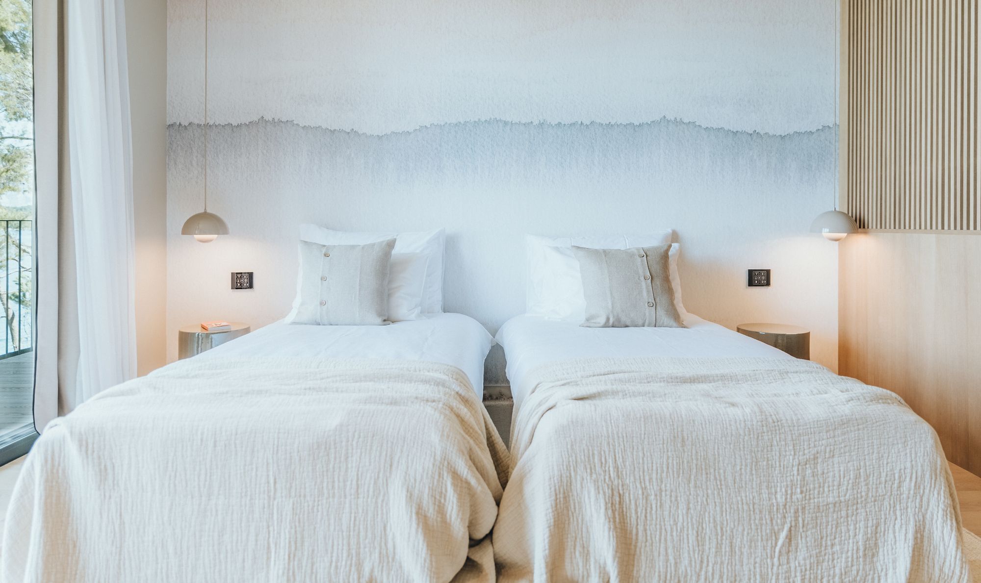 Twin beds in a cozy bedroom in Villa Cove Hvar