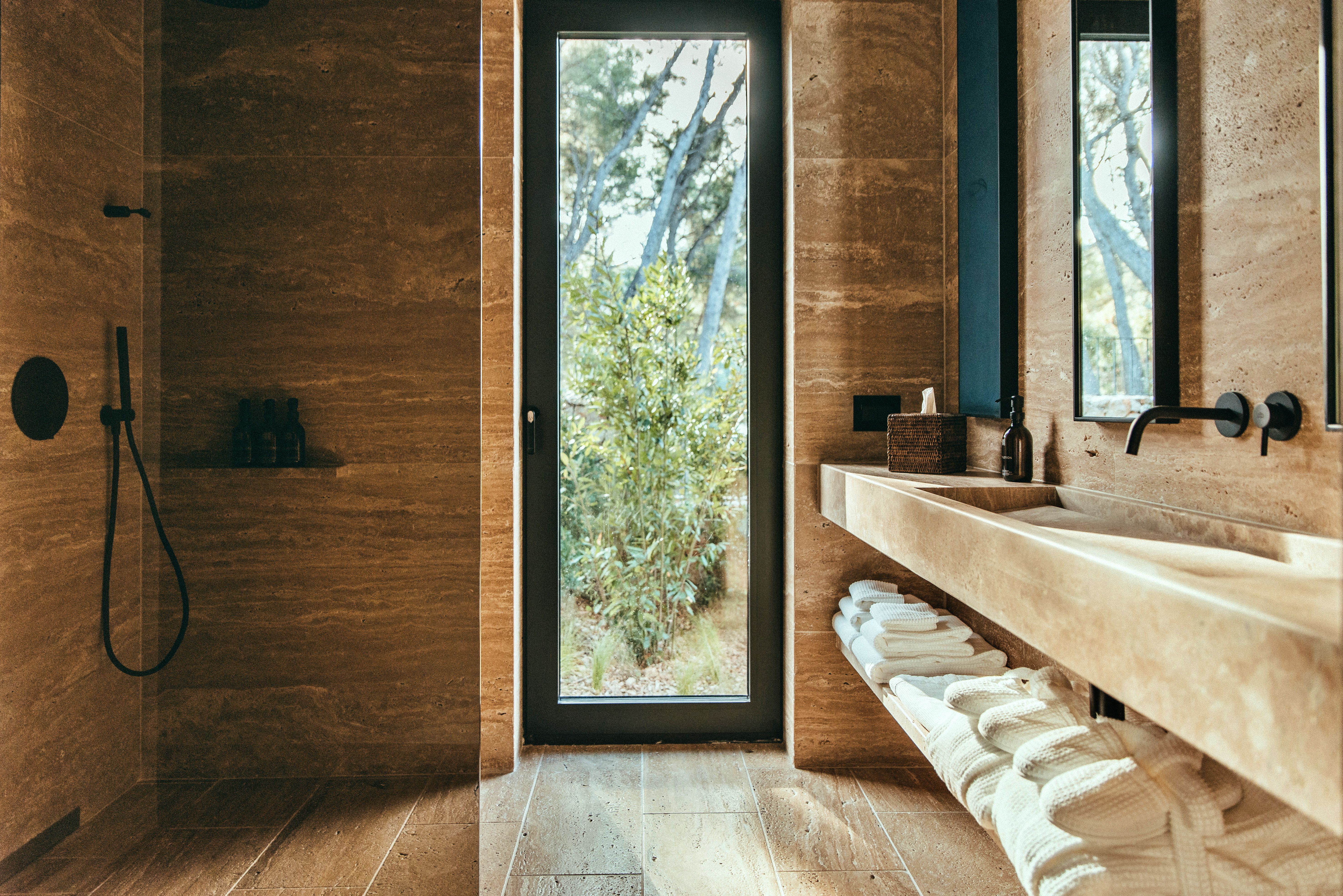 Lovely ensuite bathroom with garden view on the island of Hvar in Villa Cove