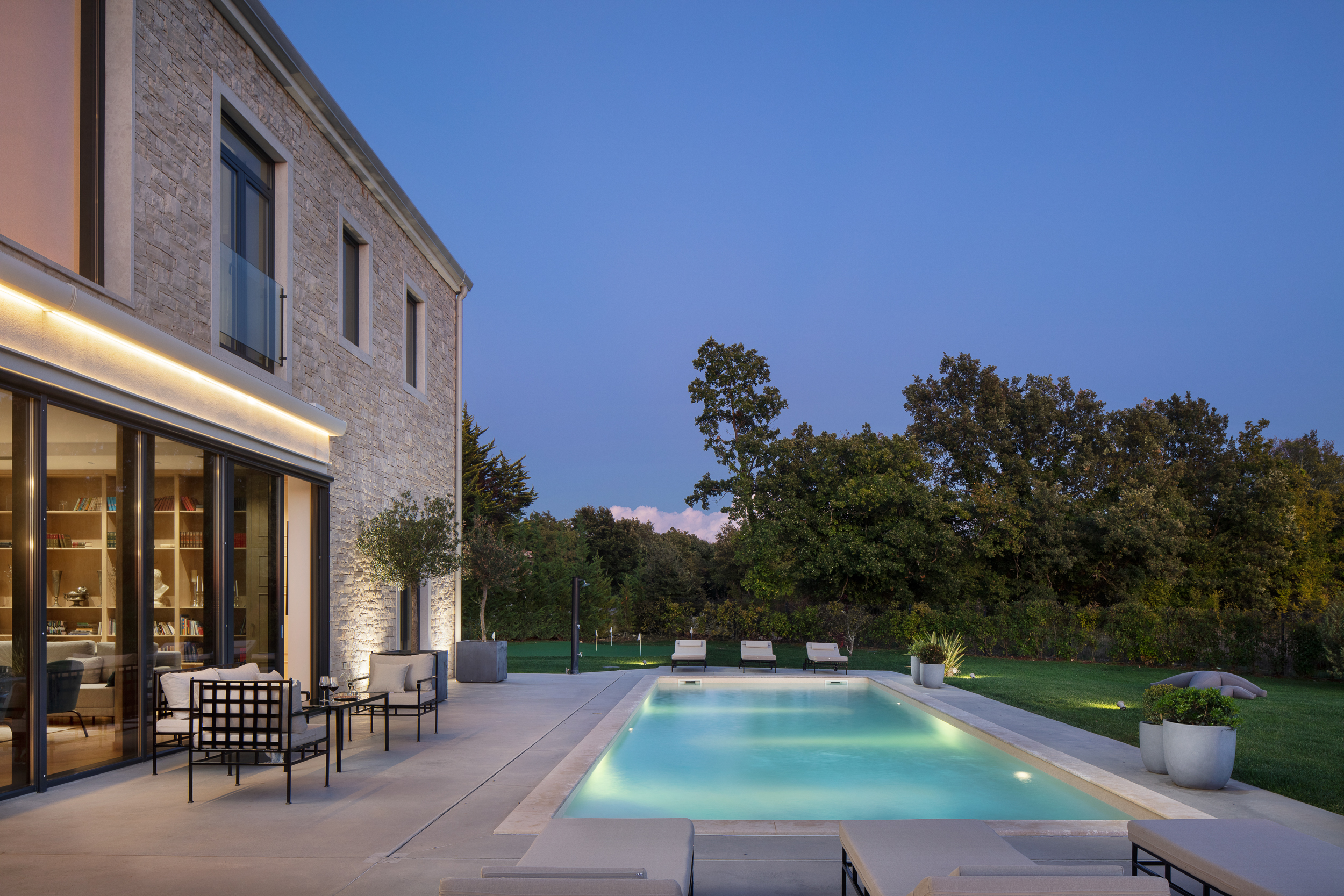 Evening by the pool in Villa Donna Istria