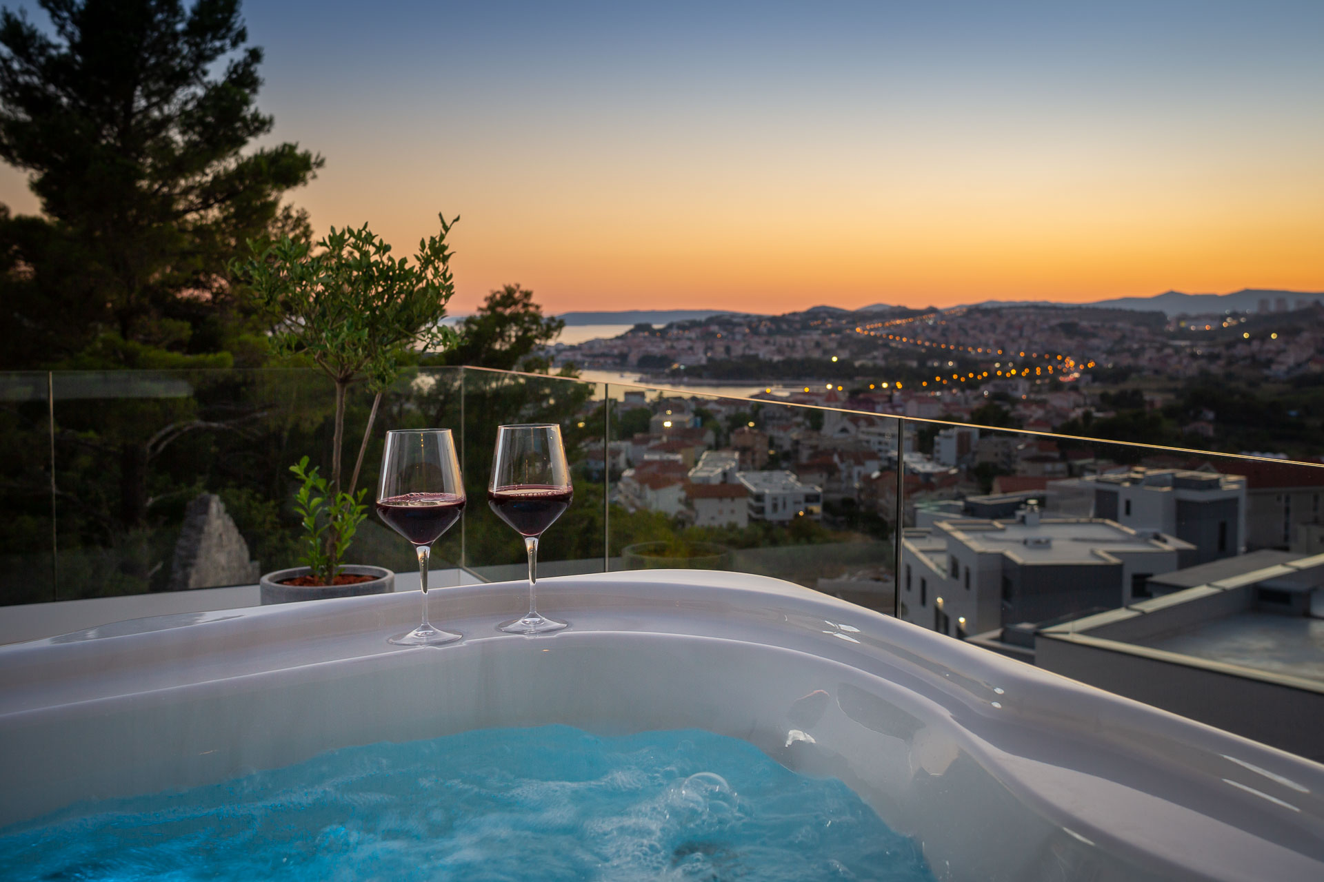 Sunset from the Jacuzzi terrace in Villa Marinero Split overlooking the city of Split