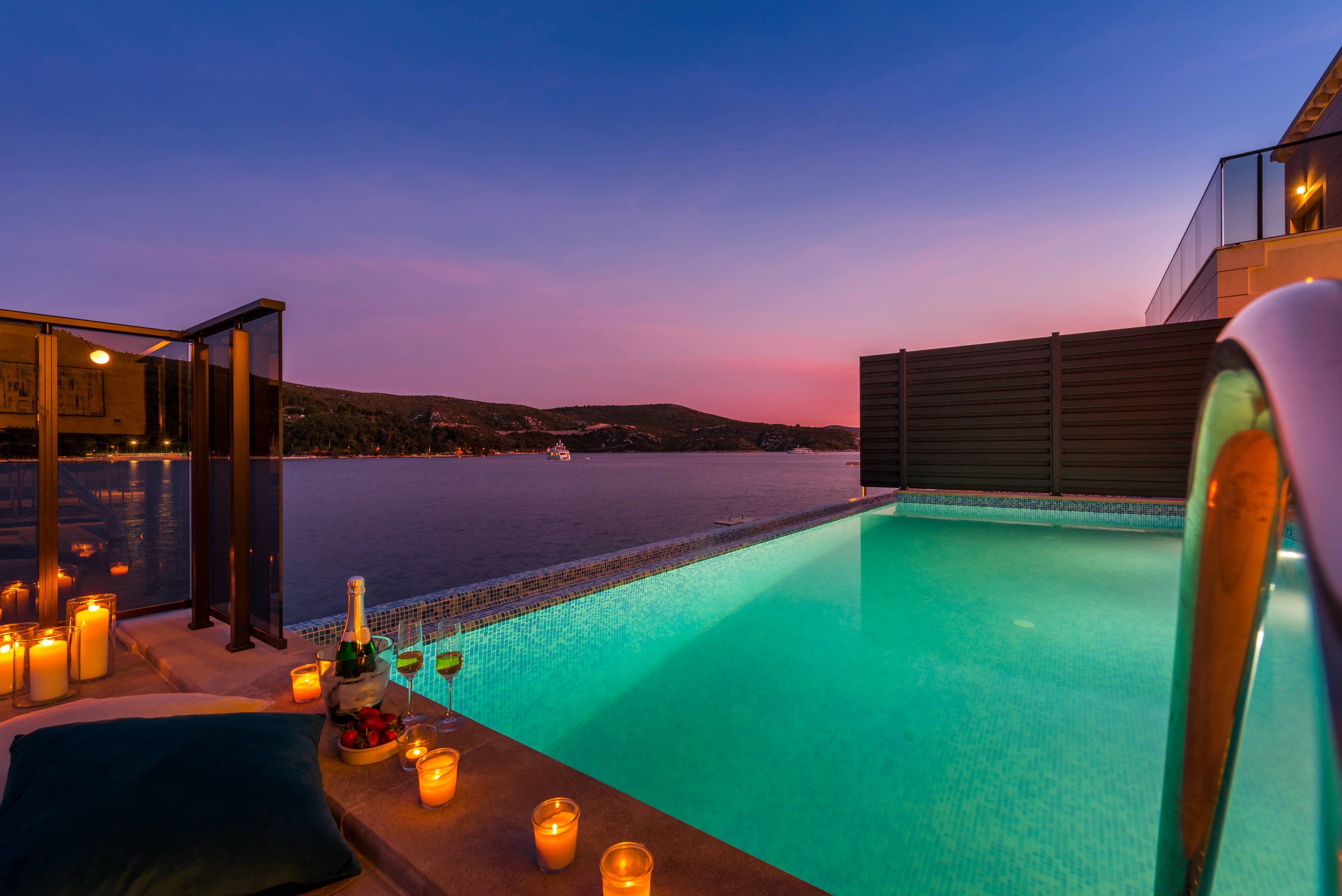 Perfect sunset and candle lights around the pool in Villa Ocean Blue III in Slano, near Dubrovnik