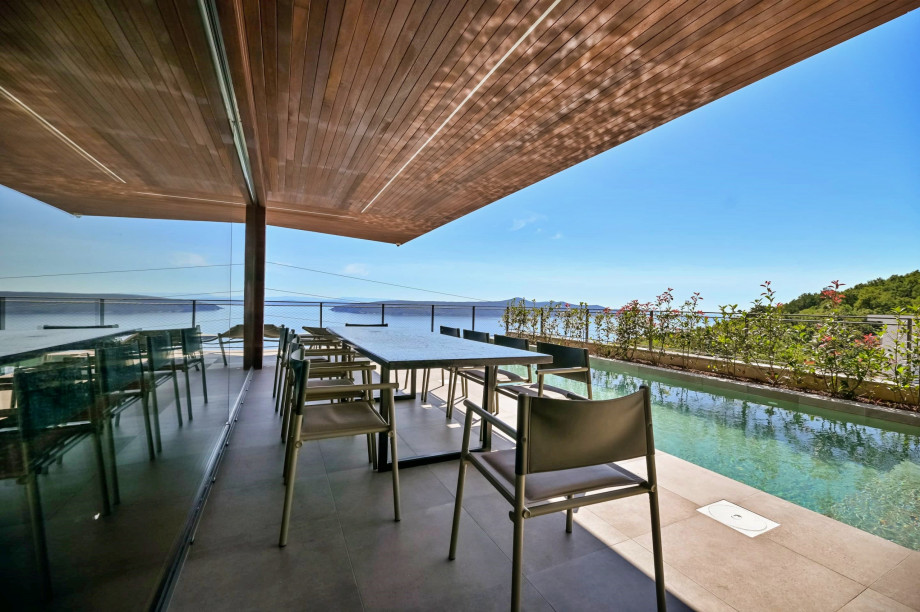 Outdoor dining area with pool in Villa Vista Hills, Opatija area
