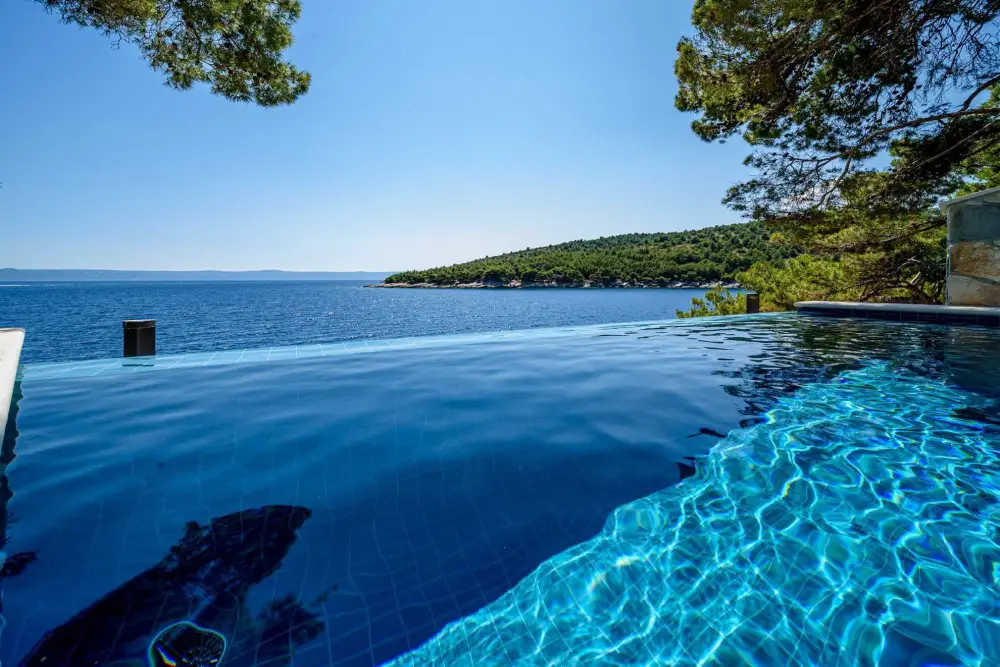 Beachfront villa Jewel Brac with heated pool