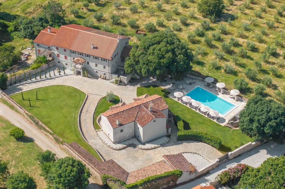 Aerial photo of Villa Serena in Istria with large pool and nature surrounding it