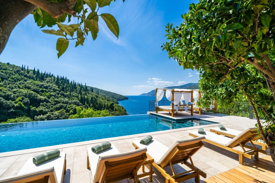 Secluded villa Aurora in Dubrovnik, featuring a pool, jacuzzi, outdoor gym, private beach, and cinema room by the sea