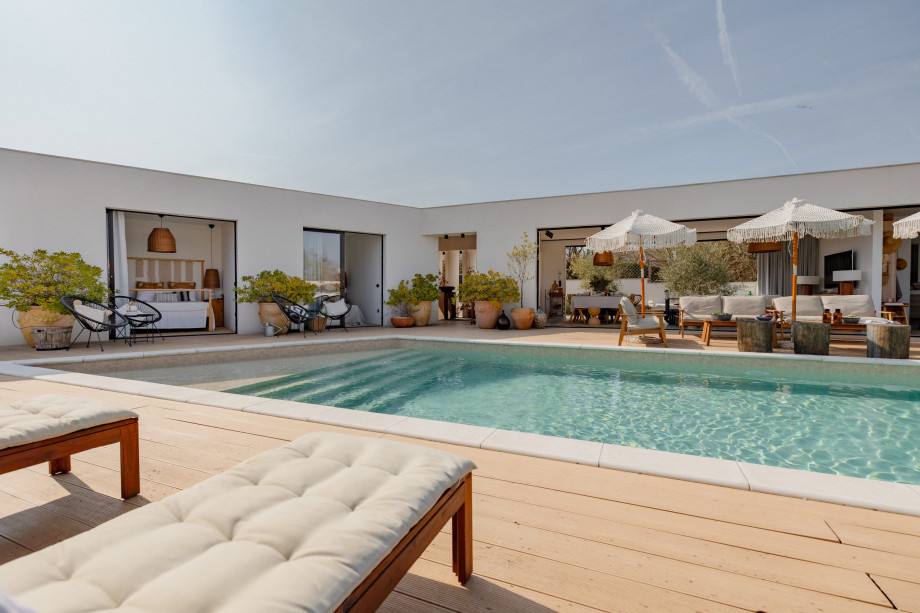 Lovely terrace with teak floor, sun beds and a pool in a charming Istrian villa with pool