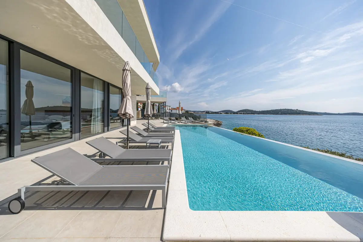 Luxury beachfront villa in Rogoznica with heated pool