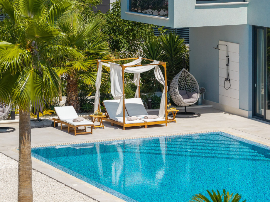 Luxury villa Golden Primosten with pool and sun beds on the terrace